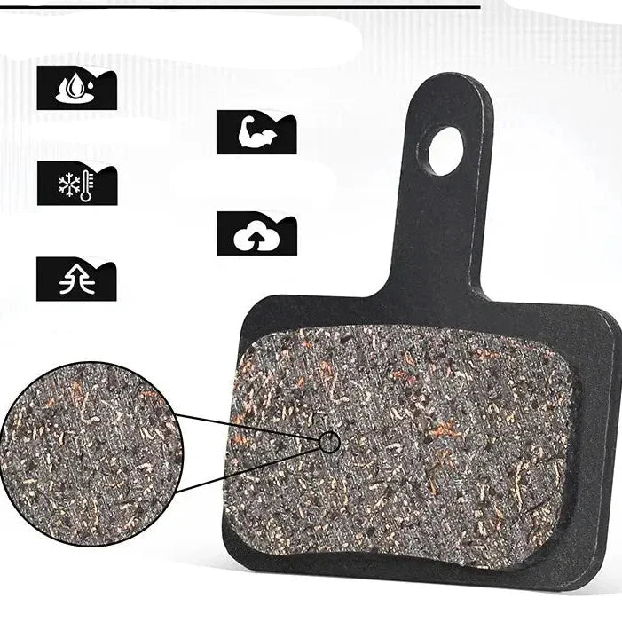 Sintered semi-metallic brake pads